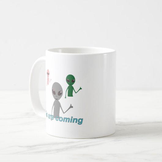 Mug Aliens montrant un geste "j'aime" (Devant gauche)