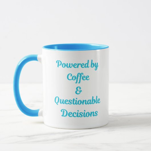 Mug Alimenté par le Café & des Décisions Discutables – (Gauche)