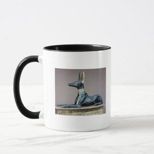 Mug Anubis, un dieu égyptien des morts d'un coffre (Gauche)