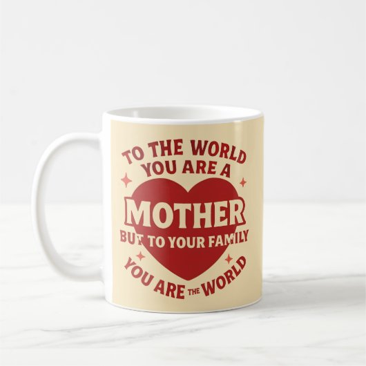Mug Au monde vous êtes une mère, mais à votre famille (Gauche)