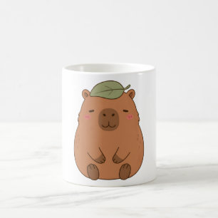 Mug avec un capybara mignon et une feuille verte s
