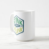 Mug Badge Ça Pue Ça Pua (Devant gauche)