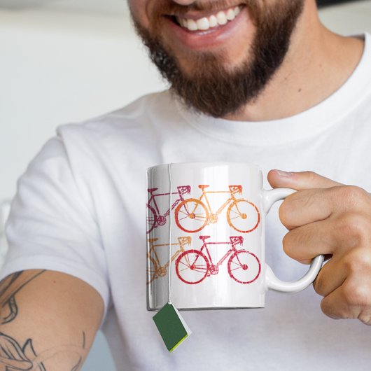 Mug Bicyclettes colorées chevauchant roues