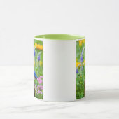 Mug Bluebird peins on fence post in flower garden (Centre)