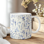 Mug Boho Navy Fleurs sauvages d'aquarelle bleu<br><div class="desc">Commencez votre journée avec une touche de charme boho en utilisant la "Boho Navy Blue Watercolor Fleur sauvage Coffee Mug." Cette tasse magnifiquement conçue présente de délicats fleurs sauvages bleu marine peints dans un style aquarelle, apportant une atmosphère élégante et sereine à votre café ou thé du matin. Le motif...</div>
