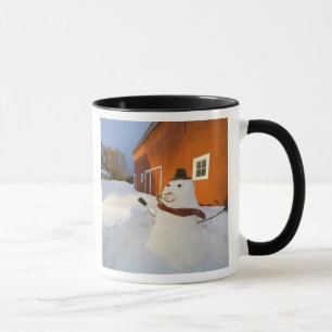 Mug Bonhomme de neige devant la grange rouge en
