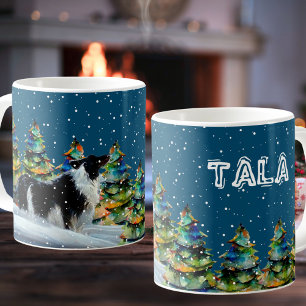 Mug Border Collie dans la forêt enneigée d'hiver arbre