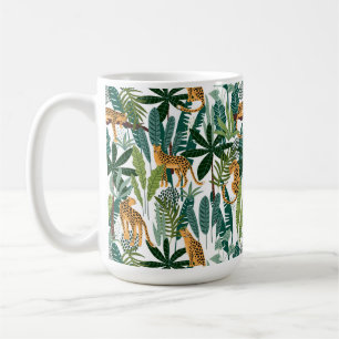 Mug Brown leopard in the tropical lush jungle leaves