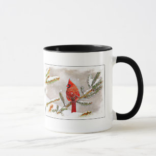 Mug Cardinal dans un pin en hiver