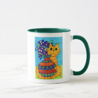 Chat avec des iris dans le vase de Talavera