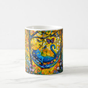 Mug Chat dans un hamac sous un arbre