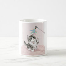 Chaton KAM KAM joueur et duveteux attrapant un jou