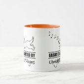 Mug Chien facilement distrait par des joueurs de basse (Centre)