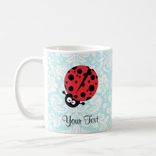 Mug Coccinelle turquoise de motif de damassé (Gauche)