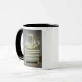 Mug Coffre avec un bateau décoré de deux têtes (Devant gauche)
