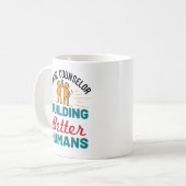 Mug Conseiller scolaire Construire de meilleurs humain (Devant gauche)