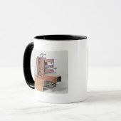 Mug Couseuse', la première machine à coudre, 1830 (Devant gauche)