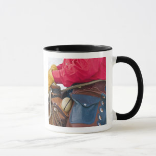 Mug Cow-boy sur un cheval portant des chaps en cuir