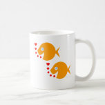 Mug Cute Cartoon Goldfish Newlyweed in Love Honeymoon<br><div class="desc">Cute Cartoon Goldfish Newlyweds in Love Honeymoon Coffee Mug présente une mignonne paire de poissons qui pourraient être un couple engagé, ou peut-être seulement amoureux, nageant en tandem, soufflant de minuscules coeurs rouges comme des baisers au lieu de bulles. Votre message va de l'autre côté. Le texte est personnalisable, alors...</div>