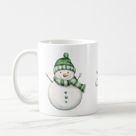 Mug Cute Snowman dans Green Scarf et Knit Beanie (Gauche)