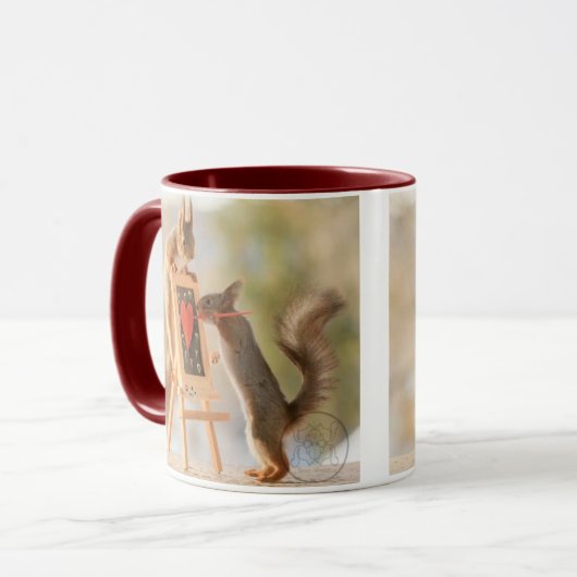 Mug Des écureuils peignent une image (Devant gauche)