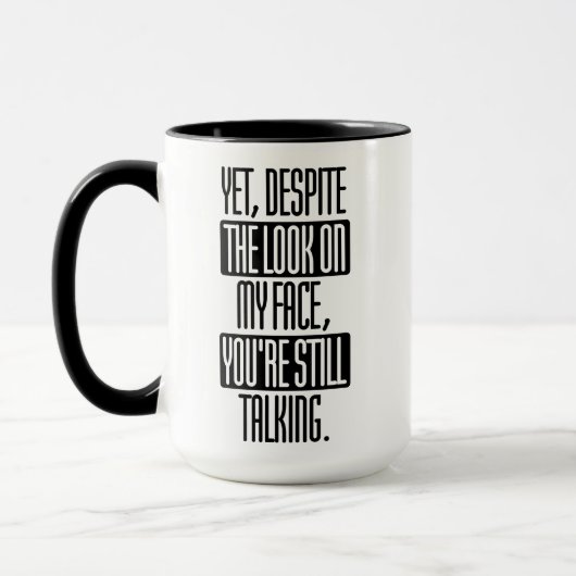 Mug en dépit du regard sur mon visage vous parlez (Gauche)