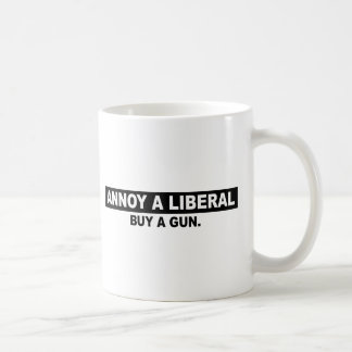 MUG ENNUYEZ UN ACHAT LIBÉRAL UNE ARME À FEU