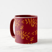 Mug Feuilles de branches de silhouette orange sur roug (Devant gauche)