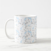Mug Fleurs blanches sur bleu clair. (Gauche)