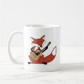 Mug Fox jouant la guitare (Gauche)