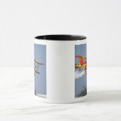 Mug Gene Soucy effectuant des acrobaties en Grumman (Centre)
