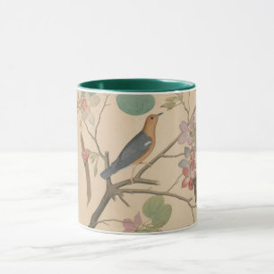 Mug Grive et mite moulues sur une branche d'orchidée