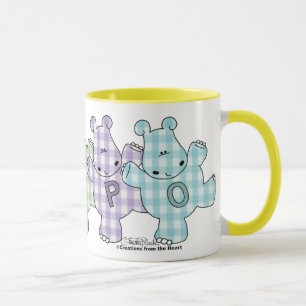 Mug Guingan heureux de pastel d'hippopotames