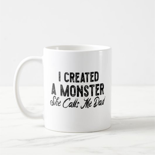 Mug I created a monster she calls me dad. Gift for Dad (Gauche)