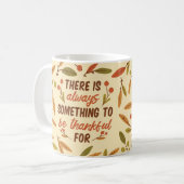 MUG IL Y A TOUJOURS QUELQUE CHOSE À REMERCIER. (Devant gauche)