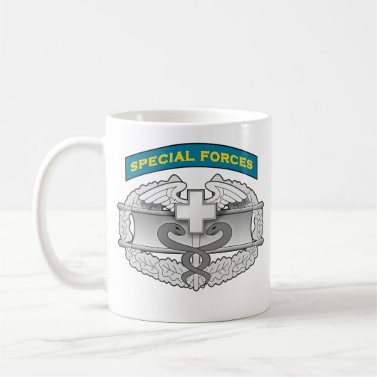 Mug Insigne de médecin de Q-étiquette et de combat de (Gauche)