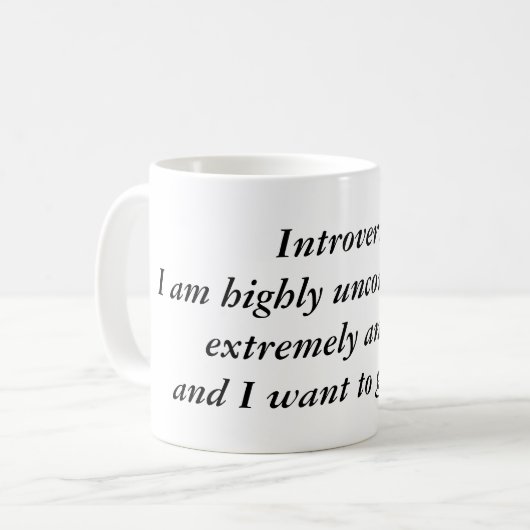 Mug Introvert : Powered by Silence & Caffeine (Devant gauche)