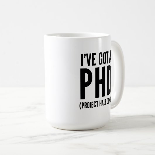 Mug J'ai un PHD (projet à moitié terminé) (Devant droit)