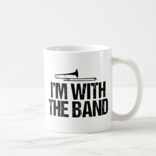 Mug Je suis avec le joueur de trombone drôle de bande