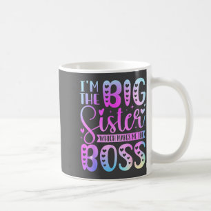 Mug Je suis la grande sœur, ce qui fait de moi le patr
