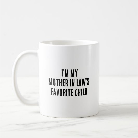 Mug Je suis l'enfant préféré de ma belle-mère, c'est d (Gauche)