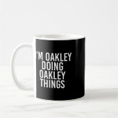 Mug Je suis Oakley Doing Oakley Things Nom Amusant Ann (Gauche)