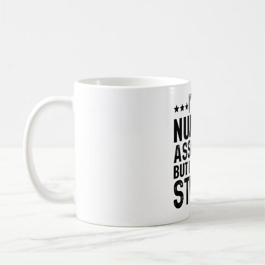 Mug Je suis une assistante en soins infirmiers, mais j (Gauche)