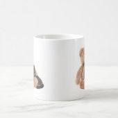 Mug kitten in the arms of a teddy bear (Centre)