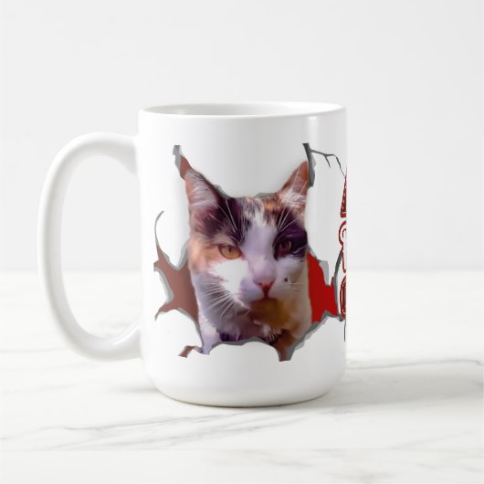 Mug Kitten sticking her head out, ready for Christmas? (Gauche)
