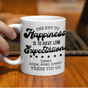 Mug La clé de la boue du bonheur, de faibles attentes