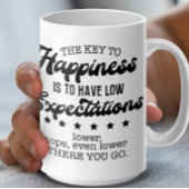 Mug La clé de la boue du bonheur, de faibles attentes