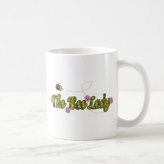 Mug la dame d'abeille avec des fleurs