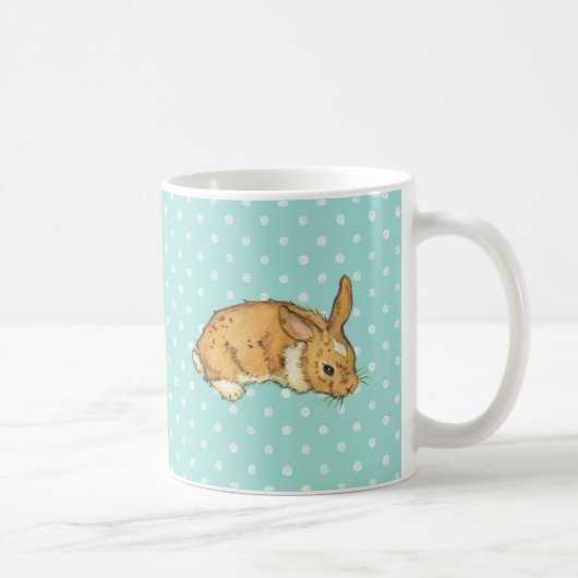 Mug lapin de bébé sur l'arrière - plan turquoise de (Droite)