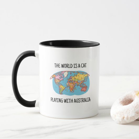 MUG LE MONDE EST UN CHAT JOUANT AVEC L'AUSTRALIE (Avec donut)